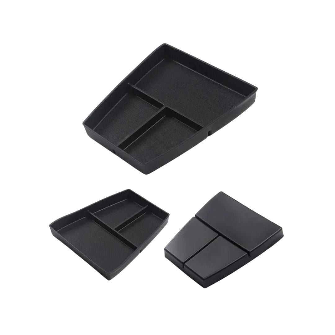 Three black plastic trays of different sizes on a white background, made for byd sealion 5