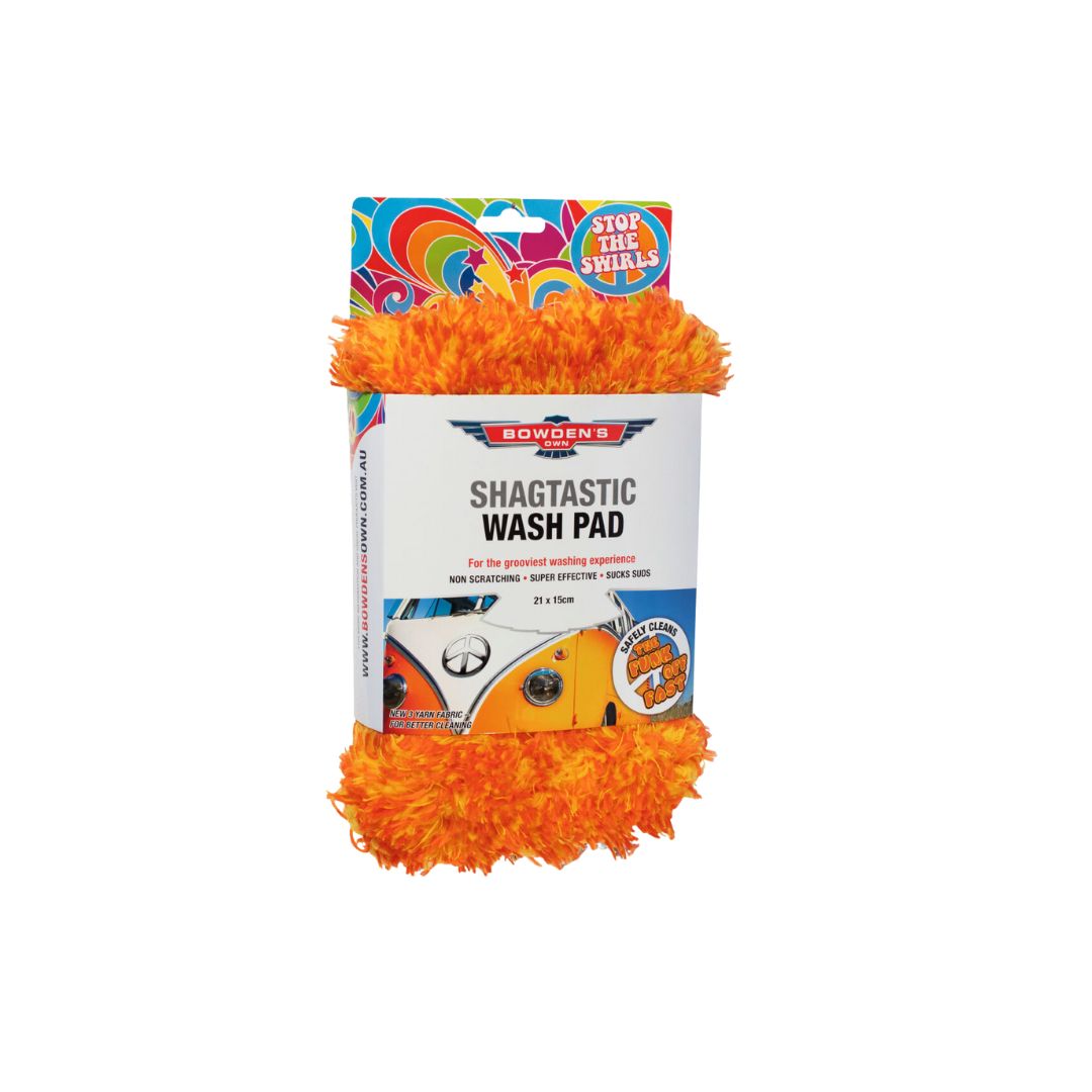 Orange wash pad with packaging on a white background